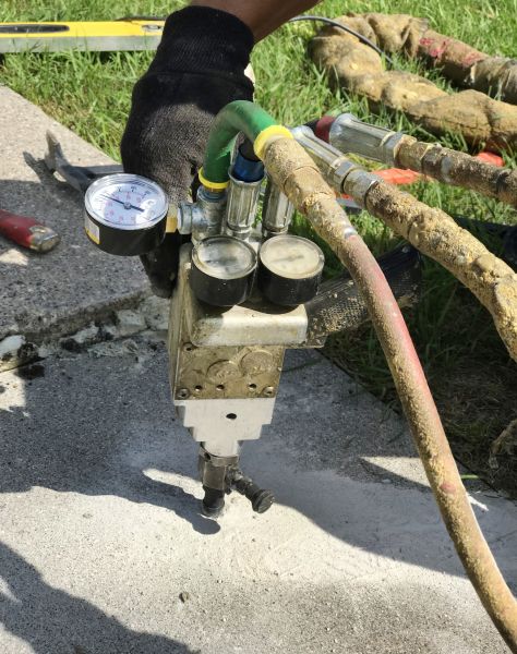 Concrete Sidewalk Lifting in White Lake